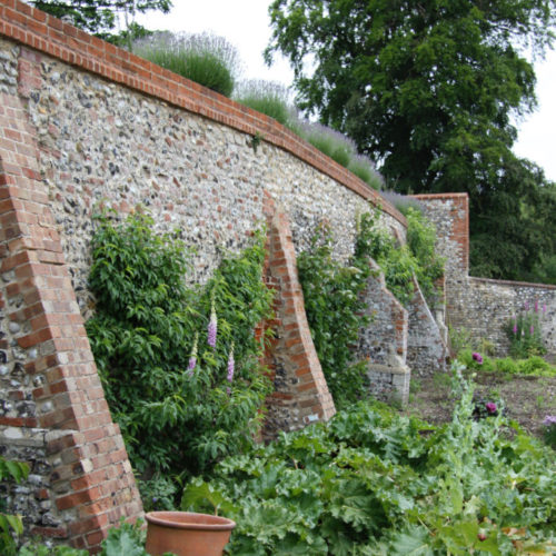 Piers For Strength On Old Garden Wall